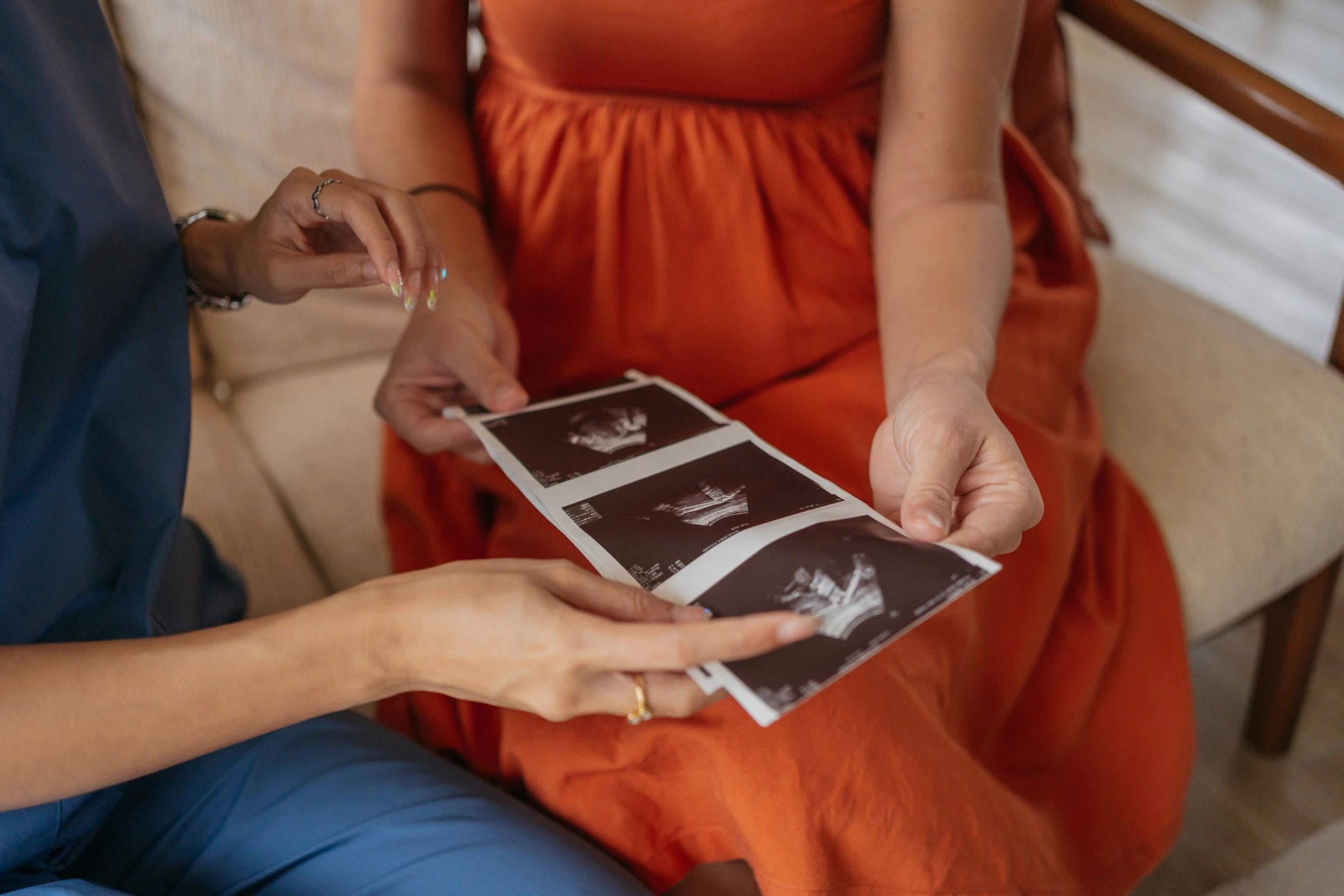 Close view of ultrasound image discussion during prenatal care